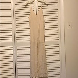 Pale pink jumpsuit/romper, never worn NWOT